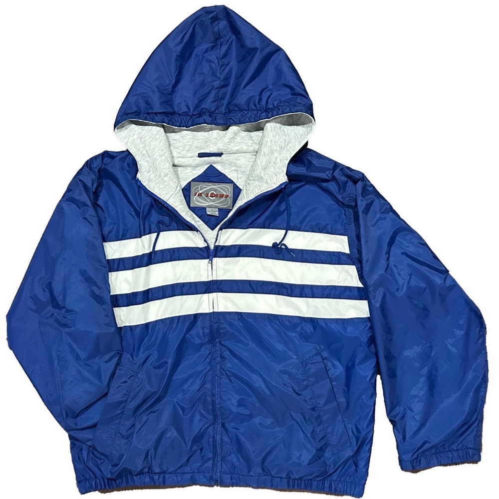 90s vintage windbreaker in a blue-white color block design by In Crowd.